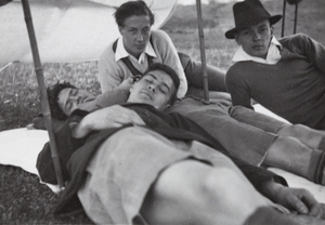 Hikers resting in a tent beside the Huangpu River, near Shanghai