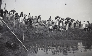 Chinese spectators, perhaps watching the rowing, Shanghai