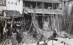 A man boarding a boat, with interested onlookers