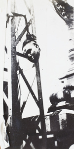 The head of a man tied to a metal post, Tianjin