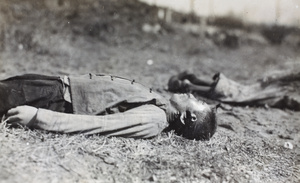 The bodies of two men, executed by a creek