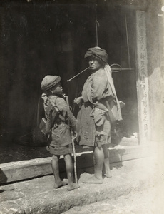 Noni woman and child, buying salt, Szemao, Yunnan Province