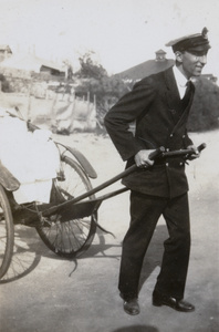 F. Hagger pretending to pull a rickshaw, Weihai (威海)