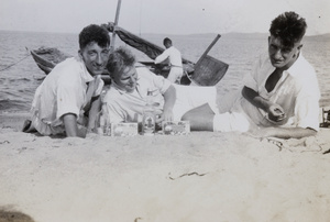 Royal Navy friends on a beach, with gin and biscuits, Weihai (威海)