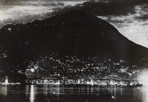 A view over the harbour towards the Peak, at night, Hong Kong