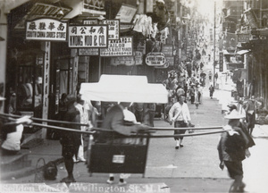 A sedan chair on Wellington Street, Hong Kong