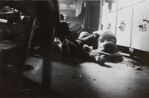 Sailors under the table, after a Christmas party, Hong Kong