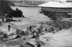 Women stonebreakers working near HMS Tamar, Hong Kong