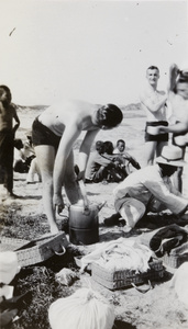 Hannan with a tea pot, during a picnic on a beach, Weihai (威海)