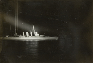 Spotlights on a warship