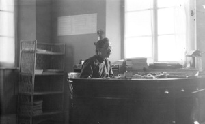 Wang Chonghui, in his office