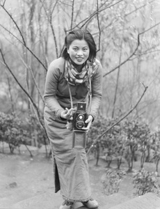 Min Chin with a camera, Northern Hot Springs, 1940