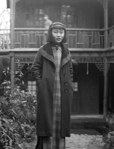 Ma Xiuzhong in front of a building, Northern Hot Springs Park