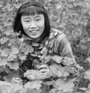 Ma Xiuzhong with geraniums, Northern Hot Springs Park