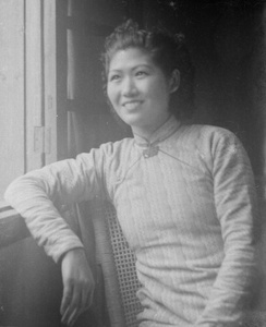 Jiang Fangling looking out of a window