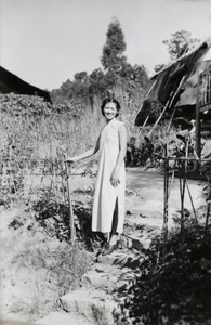 Jiang Fangling in a garden