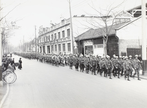 British troops (Shanghai Defence Force) setting off to march along Nanjing Road, Shanghai