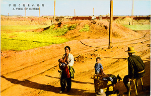 A woman feeding a baby, beside a road-side pedlar