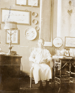 Lo Chi-ming in Hedgeland's sitting room, Tientsin