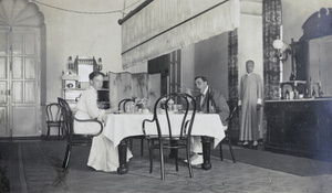 Mrs Wilzer and Hedgeland eating dinner, Commissioner's House, Lappa Island, near Macau