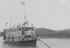 A gun boat in a river