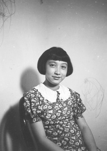Gladys Hutchinson, wearing a dress with a Peter Pan collar