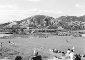 Football match and spectators, Army Sports Ground, Mongkok, Hong Kong