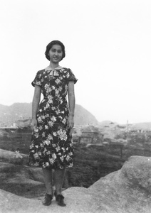 Bea Hutchinson modelling a flower print dress, Hong Kong