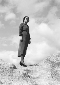 Unidentified woman modelling a polka-dot patterned dress, Hong Kong