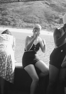 Two unidentified women wearing bathing costumes on a boat, Hong Kong