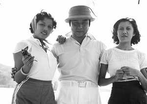 Two unidentified women and a man on a ferry boat, Hong Kong