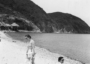 A friend lifting Lucy Shirazee's legs, South Bay Beach, Hong Kong