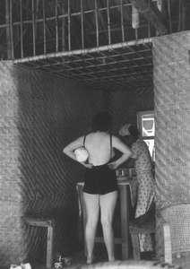 Lucy Shirazee and a friend at a beach hut, South Bay Beach, Hong Kong