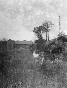 Workers, thatched buildings and creek, near Shanghai