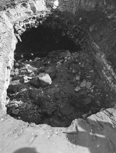 Bomb crater near Great World Entertainment Centre (大世界), Shanghai, August 1937