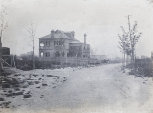 Rickshaw and servant by the bridge to the Hutchinson family house, 35 Tongshan Road, Hongkou, Shanghai