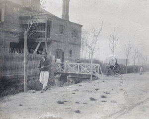 Elizabeth Hutchinson, two boys, and a rickshaw puller on Tongshan Road, Hongkou, Shanghai