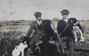John Piry and George Danson with rifles and Pointer hunting dogs