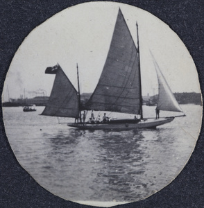 Three-sailed boat flying a British red ensign, on the Huangpu River, Shanghai