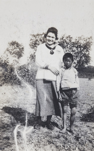Hannah with an unidentified young boy