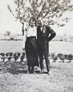 Charles Hutchinson with a young woman in the garden, 35 Tongshan Road, Hongkou, Shanghai