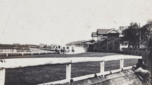 Horses racing around the course, Shanghai Race Club