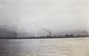 Smoking factory chimneys and the Huangpu River, Shanghai