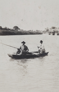 Charles and Bill Hutchinson in a punt, Shanghai