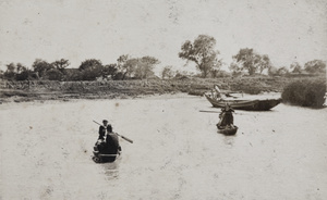 Two punts and a barge on a river, Shanghai