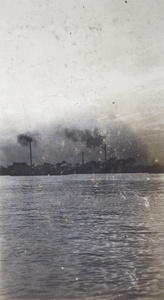 Smoking factory chimneys and the Huangpu River, Shanghai