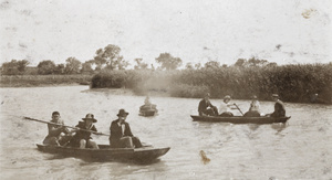 Two punts and a boat on a river, Shanghai