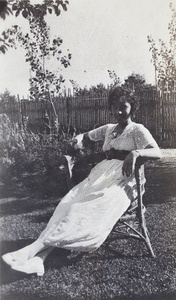 Young woman sitting in the garden, 35 Tonghshan Road, Hongkou, Shanghai