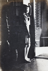 Maggie Hutchinson standing in a doorway, 35 Tongshan Road, Hongkou, Shanghai