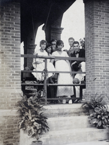 Group of friends on the verandah, 35 Tongshan Road, Hongkou, Shanghai